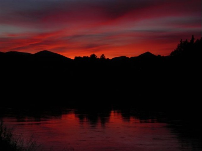 Bilde av solnedgang i Atnbrua. Fotograf ukjent. Kan noen hjelpe oss?