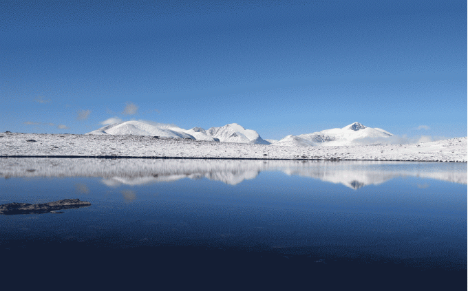 Bilde av Rondane med Neskamptjønnet i forgrunnen. Foto Kristian Dillerud
